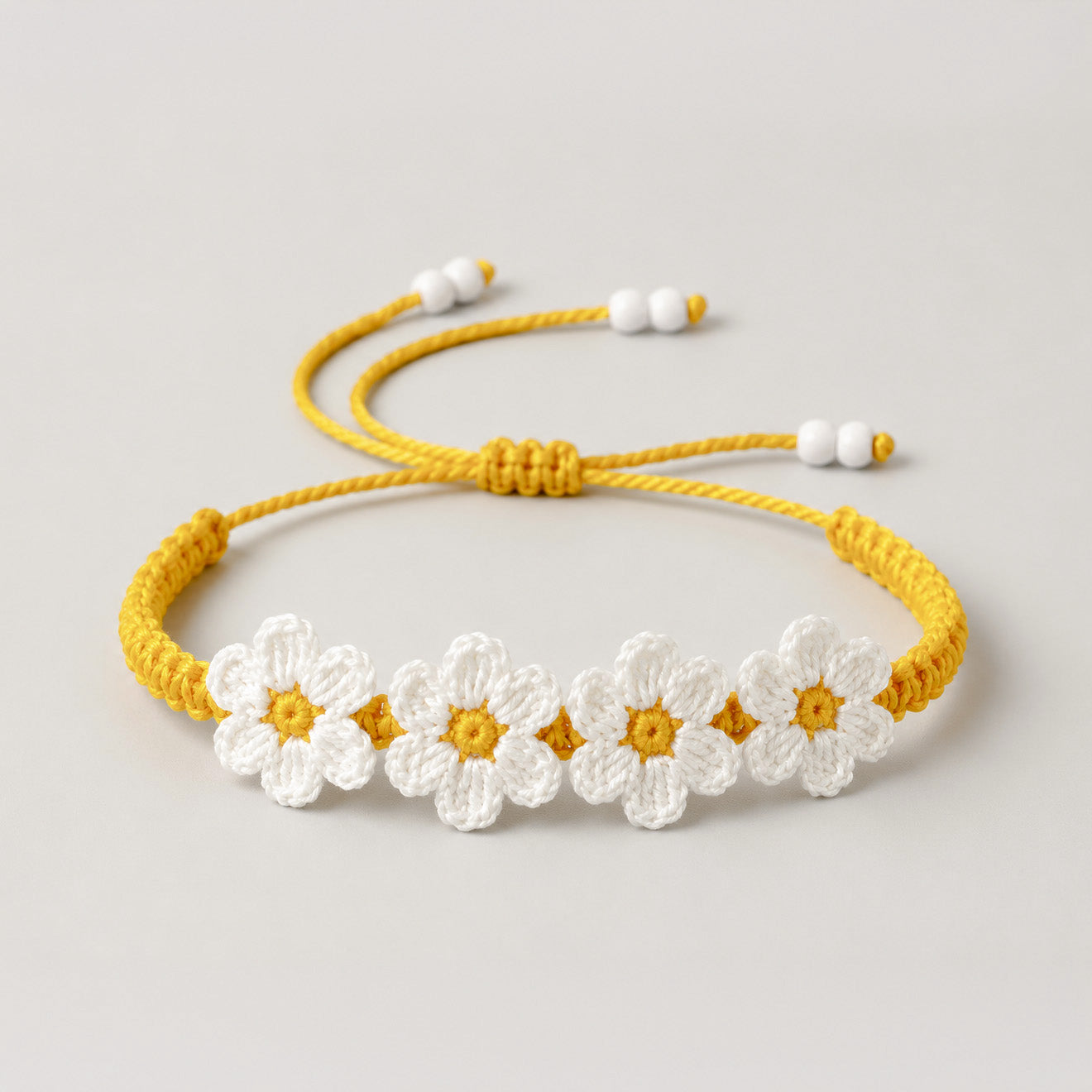 Handmade Crochet Rakhi with White Daisy Flowers