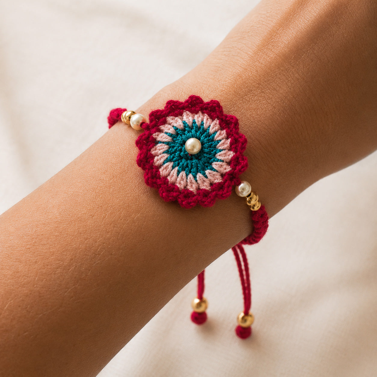 Handmade Red Crochet Rakhi with Pearl Beads | Raksha Bandhan