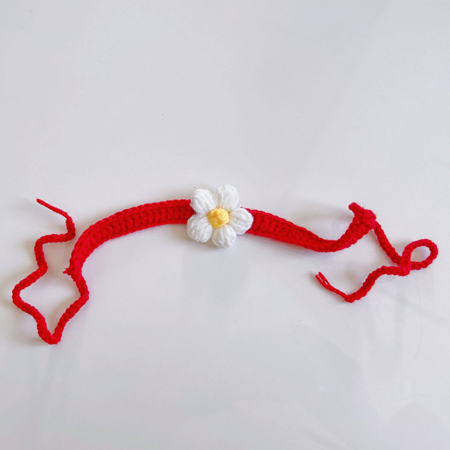 Handmade Crochet Rakhi Set – 5 Colorful Daisy Thread Rakhis