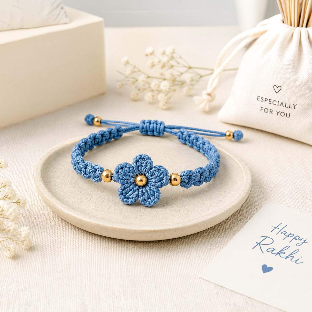 Handmade Crochet Rakhi with Blue Flower